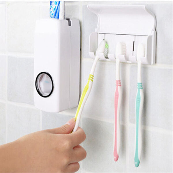 Toothpaste dispenser and toothbrush holder set