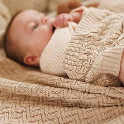 Beige knitted cotton blanket