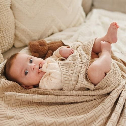 Beige knitted cotton blanket